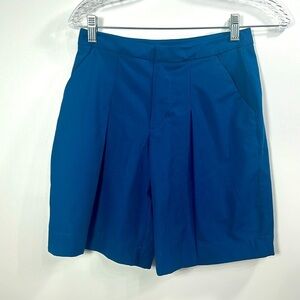 Lululemon Blue 100% polyester long front pleaded short size 4